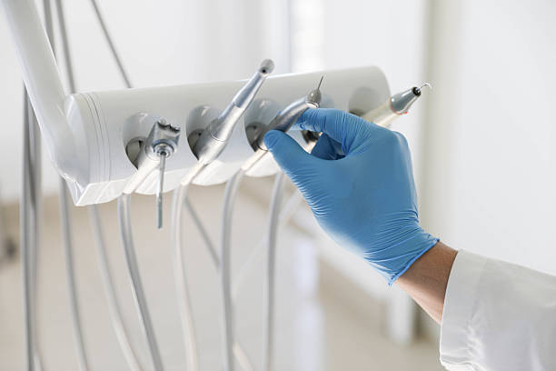 Professional Emergency Dentist technician working in Shady Shores, TX
